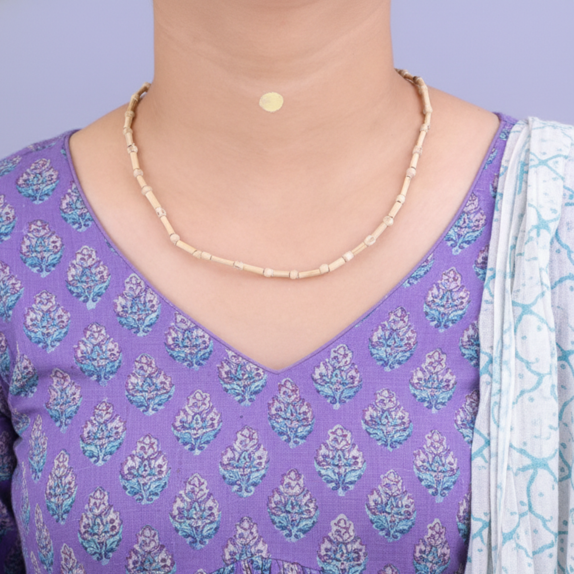Woman wearing an authentic Tulsi kanthi mala with cylindrical shaped beads