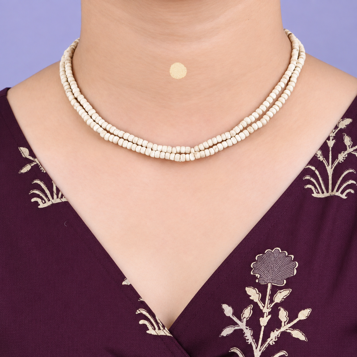 Woman wearing double-strand Tulsi Mala with original natural Tulsi beads in a traditional necklace style