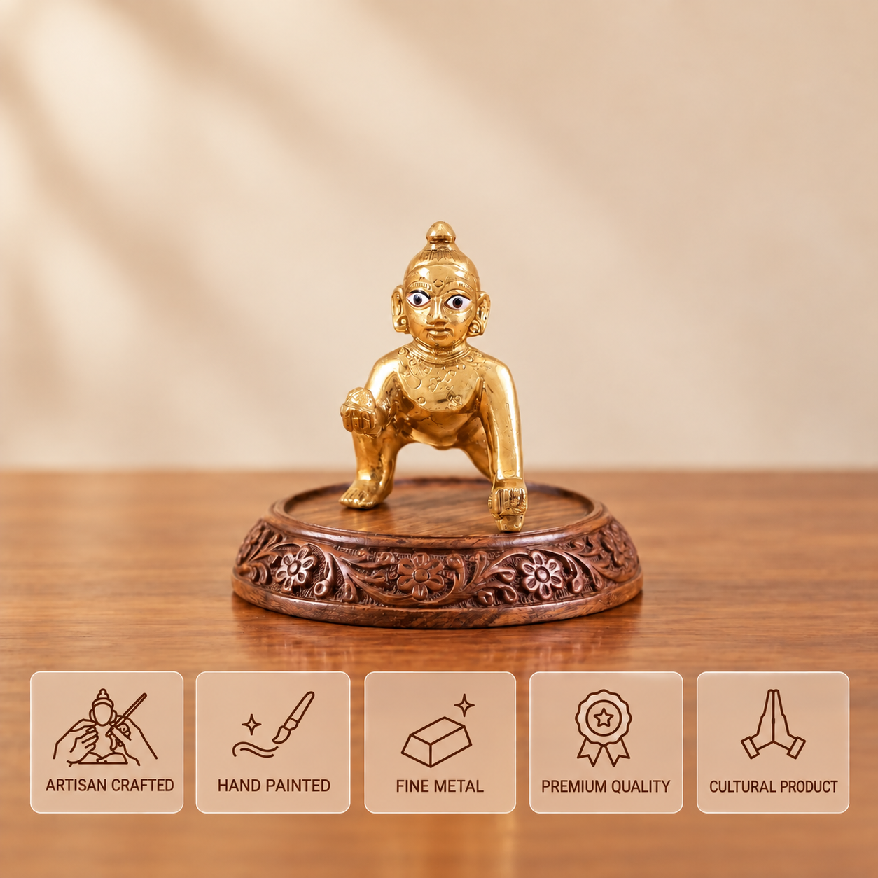 Front view of a golden crawling Laddu Gopal idol holding a sweet on a carved wooden base, with five feature cards below.