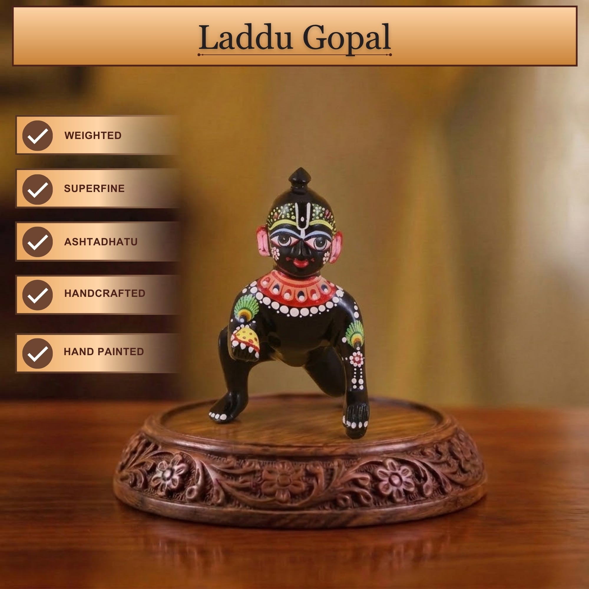 Front angle view of a little black pital Bal Gopal murti with hand-painted Shringar