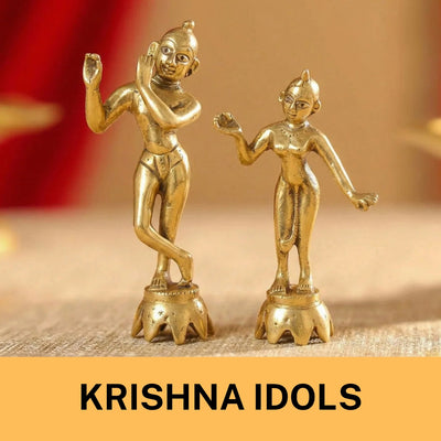Two small, handcrafted brass idols of Krishna and Radha