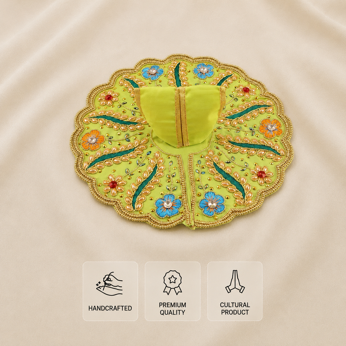 A round, scalloped embroidered fabric piece in bright yellow-green, featuring floral and leaf embroidery in blue, orange, red, and teal, with a central gold-toned opening. It is displayed on a beige satin-like fabric background with three informational badges at the bottom reading 'Handcrafted', 'Premium Quality', and 'Cultural Product'.