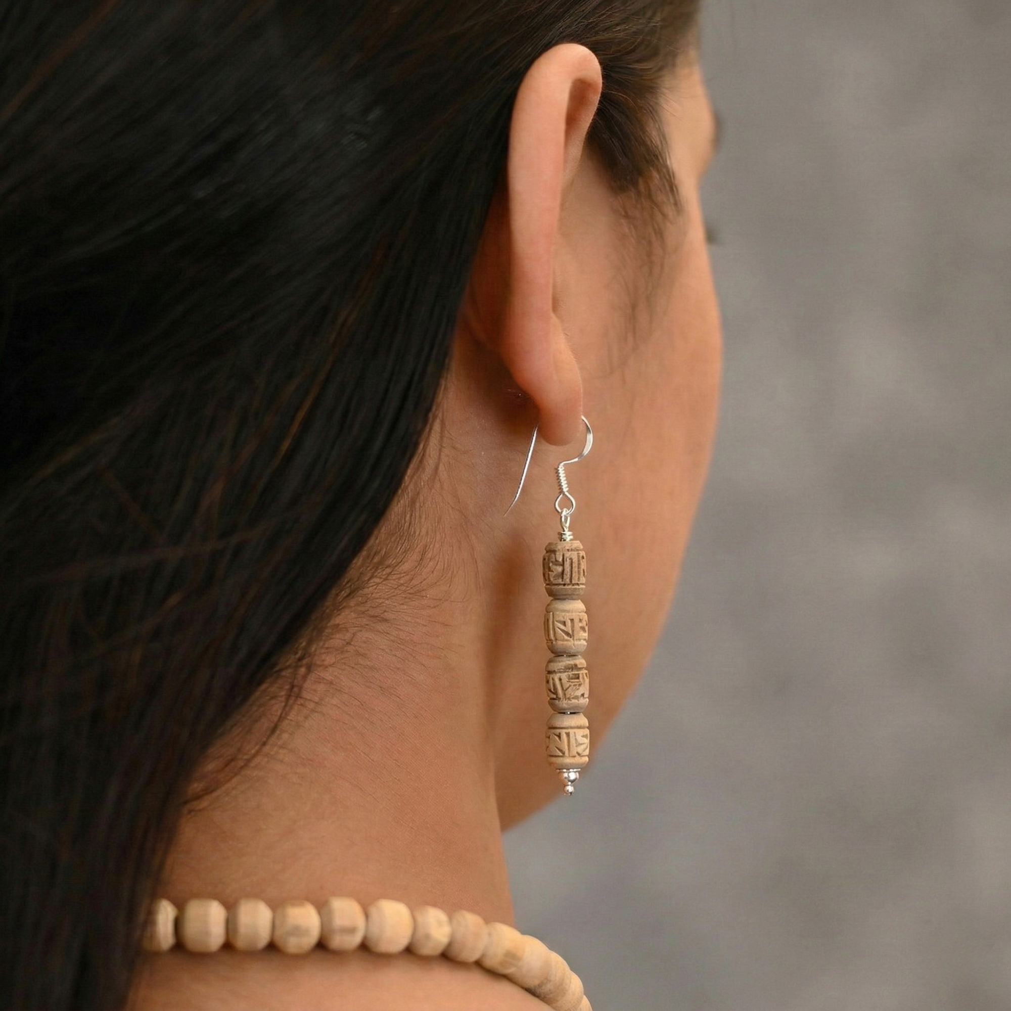 silver earrings with carved authentic Tulsi wood beads