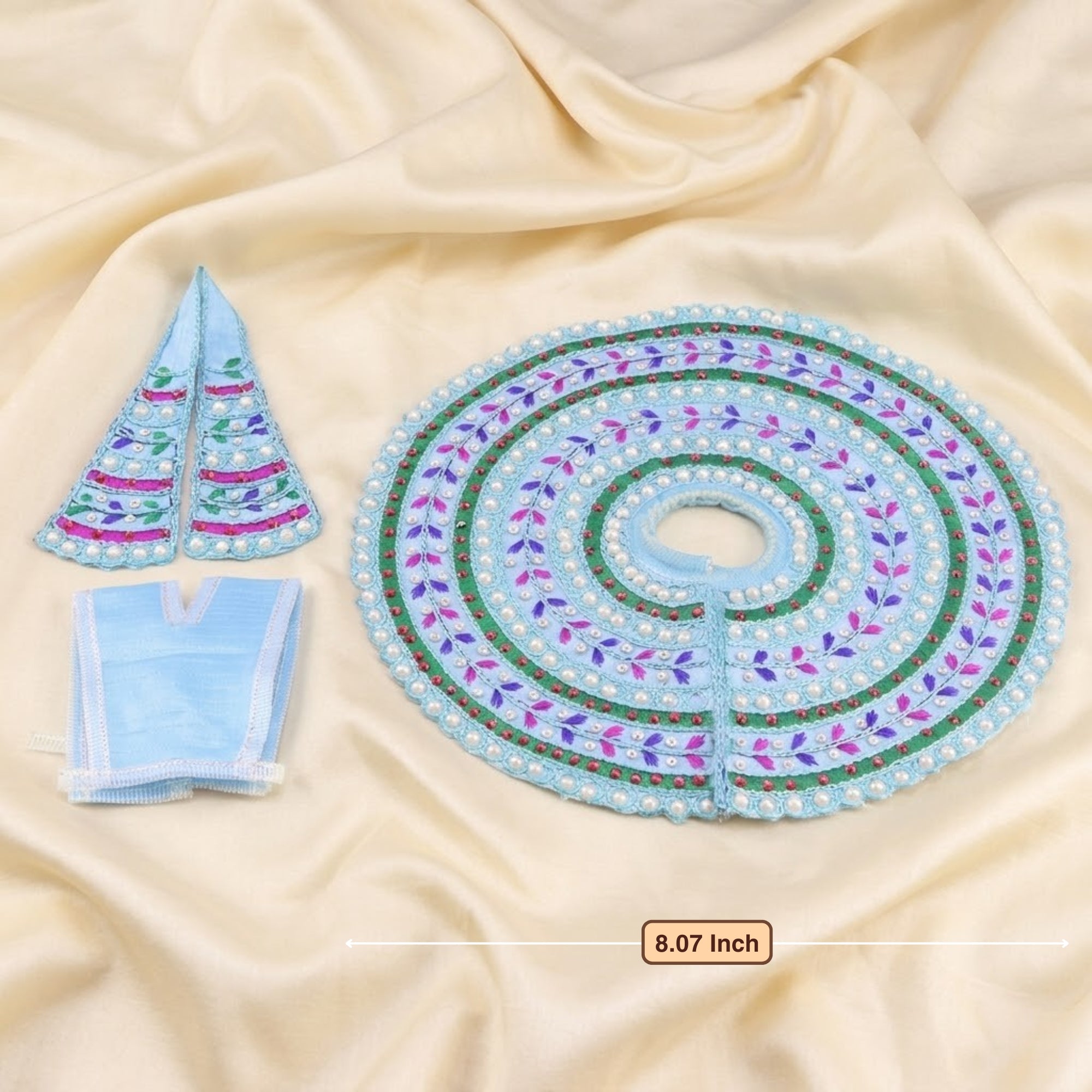 Front angle view of handmade Moti and thread work blue dress for Thakur Ji