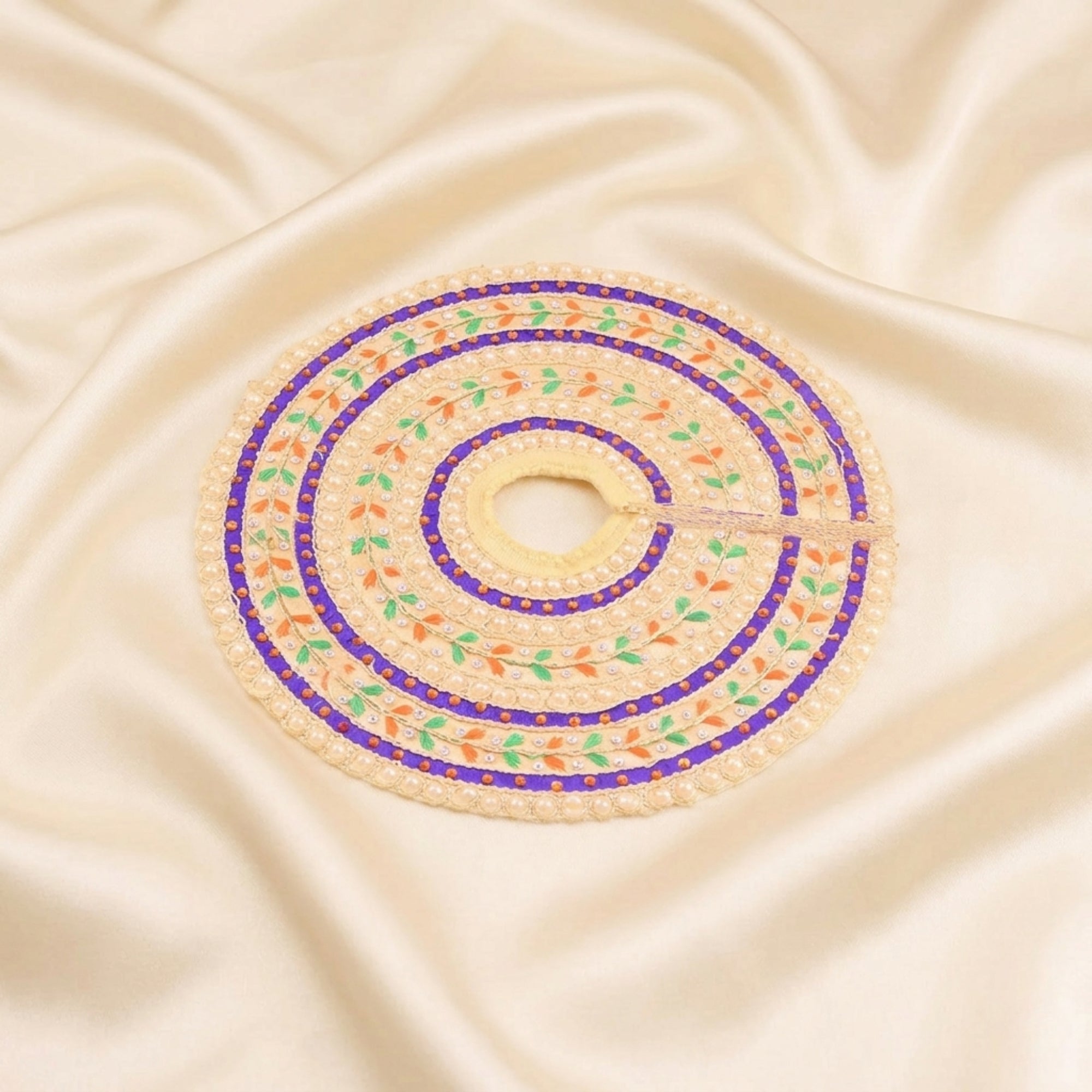 Laddu Gopal cream dress with Patka and handcrafted colourful thread work displayed flat