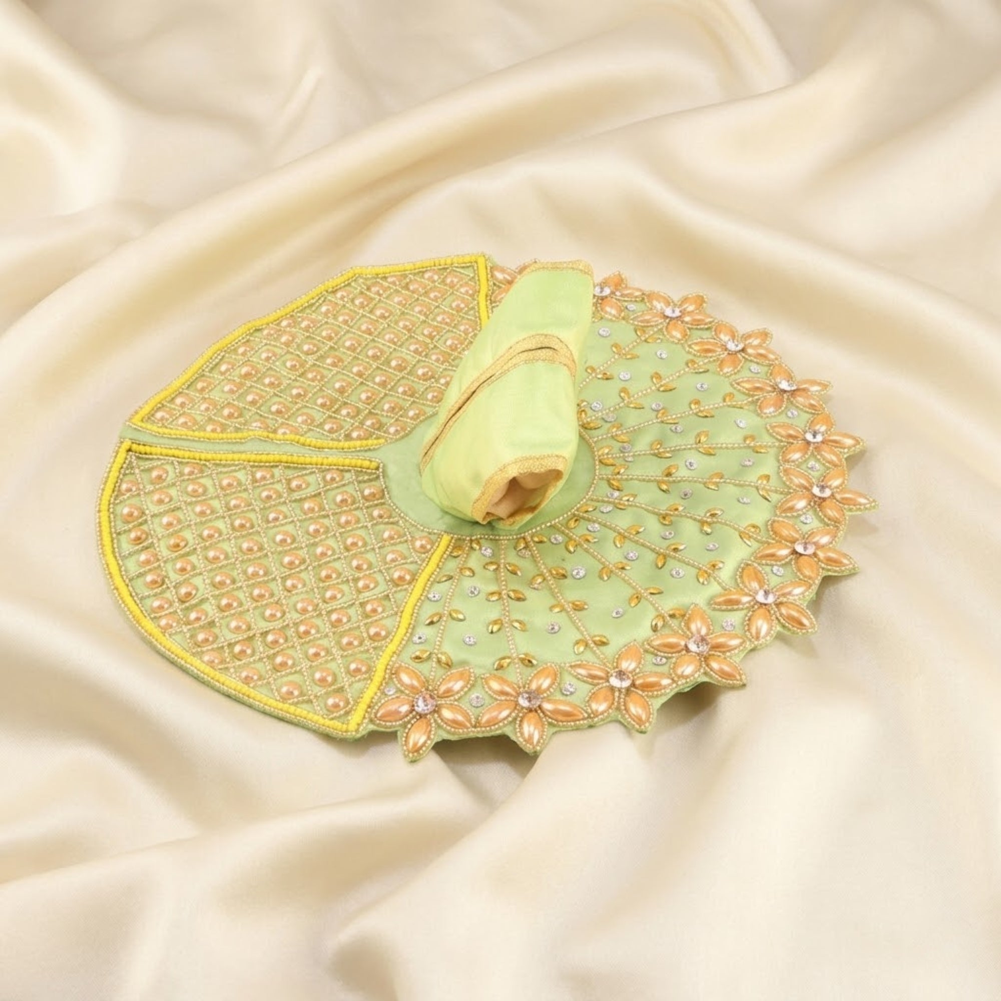 Beautiful Laddu Gopal green dress with golden floral design poshak displayed flat