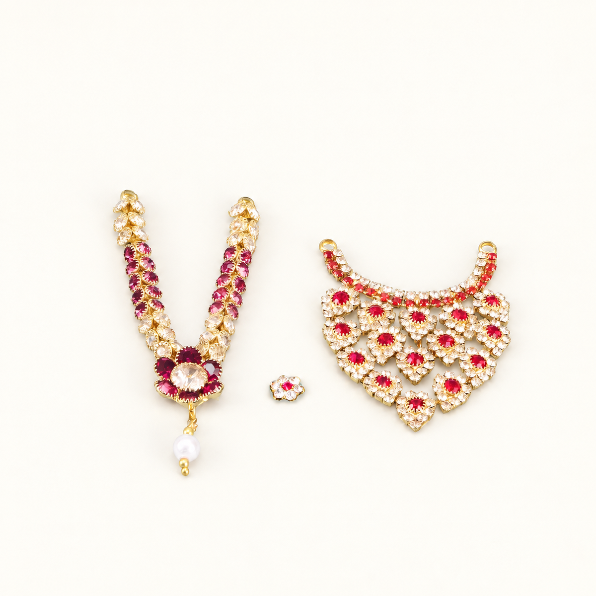 Stone-studded Laddu Gopal jewellery set with a broad choker necklace, long garland, and tikka.