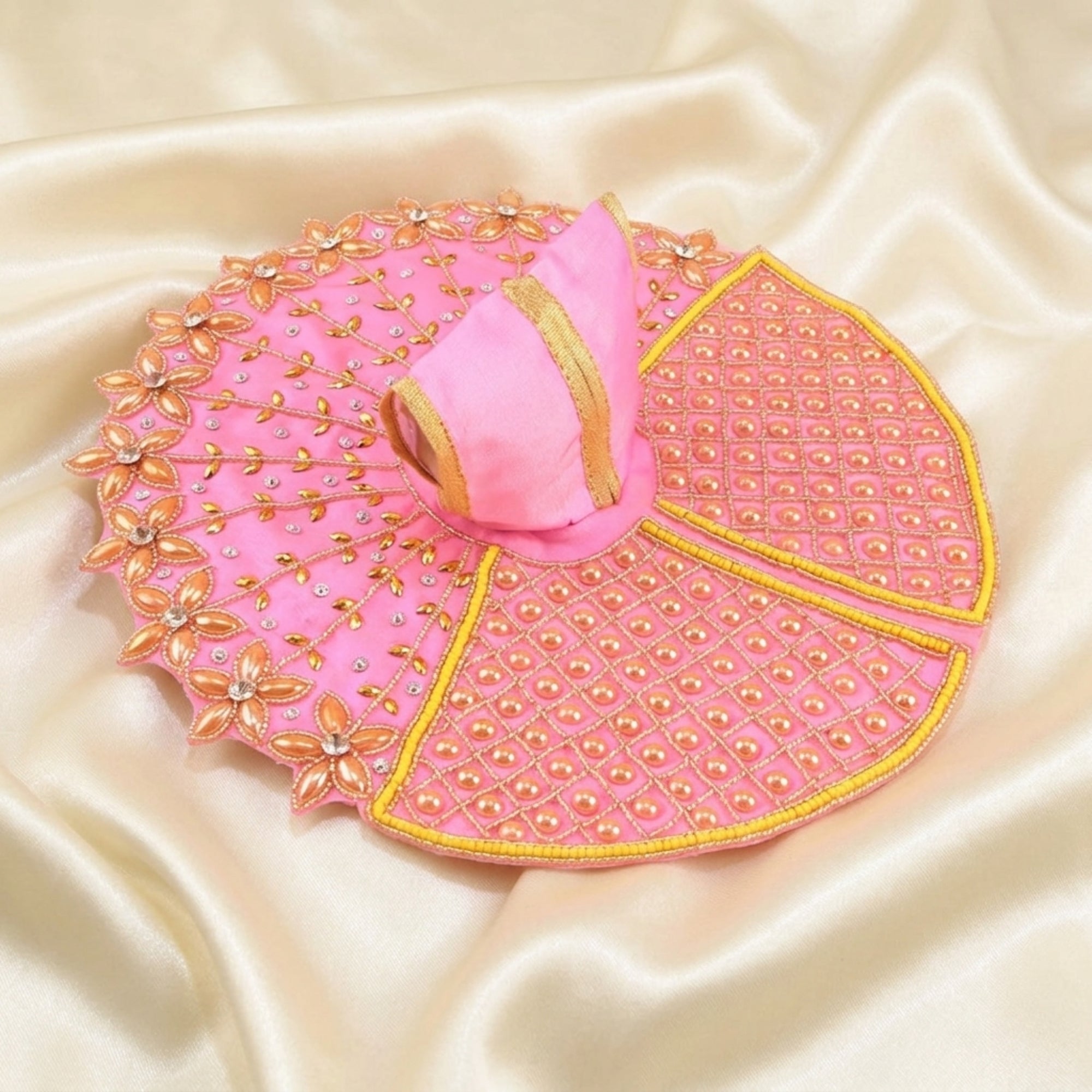Laddu Gopal pink dress with handcrafted golden floral work poshak displayed flat