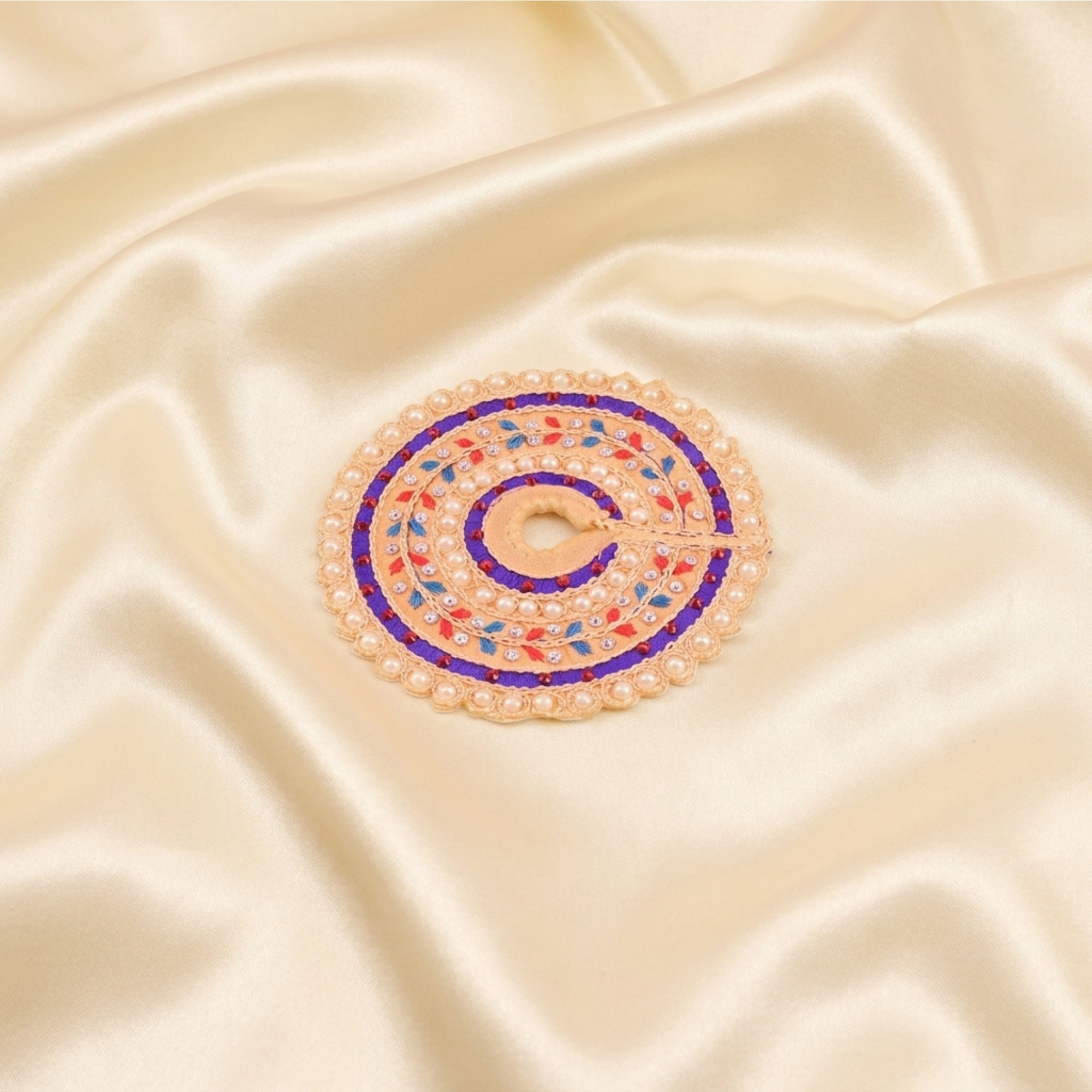 Laddu Gopal orange dress with Patka and thread work displayed flat