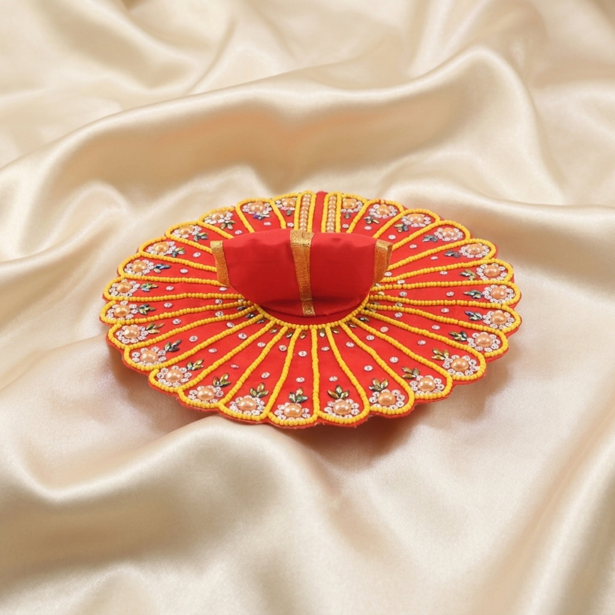 Laddu Gopal red dress with golden stone hand embroidery work displayed flat