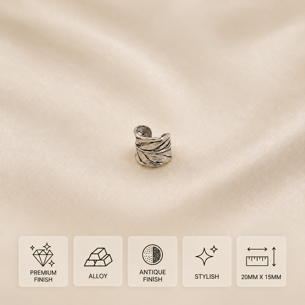 Antique-finish leaf wrap alloy ring on ivory fabric, measuring 20 × 15 mm.