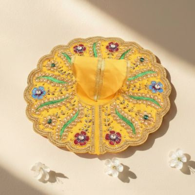 mere krishna yellow Laddu Gopal dress with floral embroidery and decorative stone work