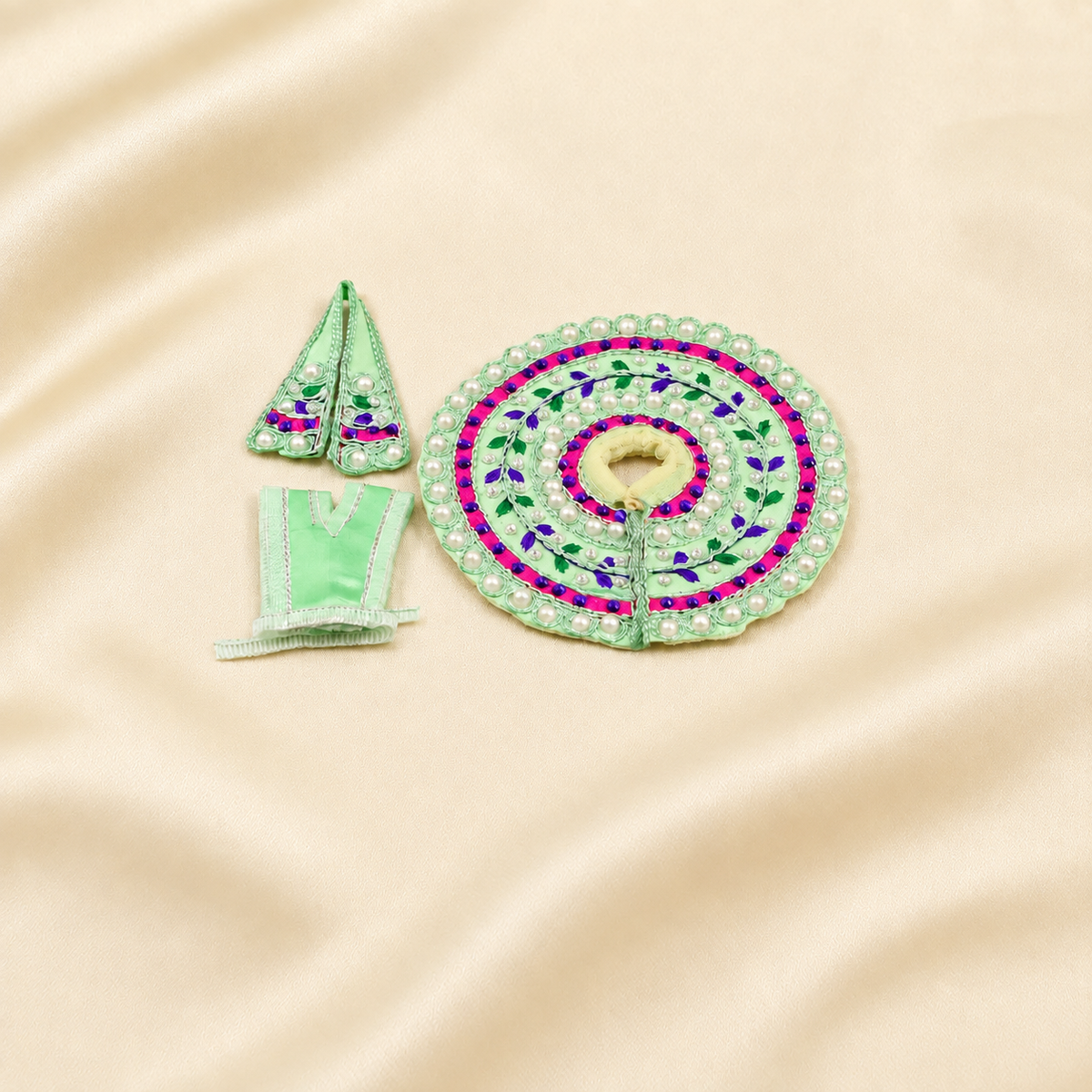 Mint green idol dress set with pearl border, pink detailing and matching accessories.