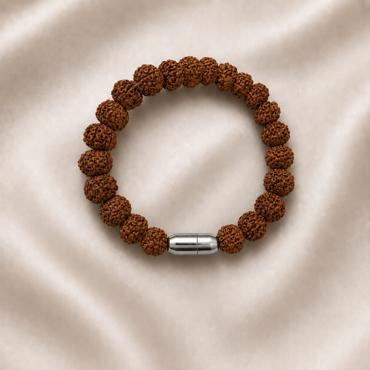 Natural rudraksha bracelet with 8mm textured beads and a polished silver magnetic clasp 