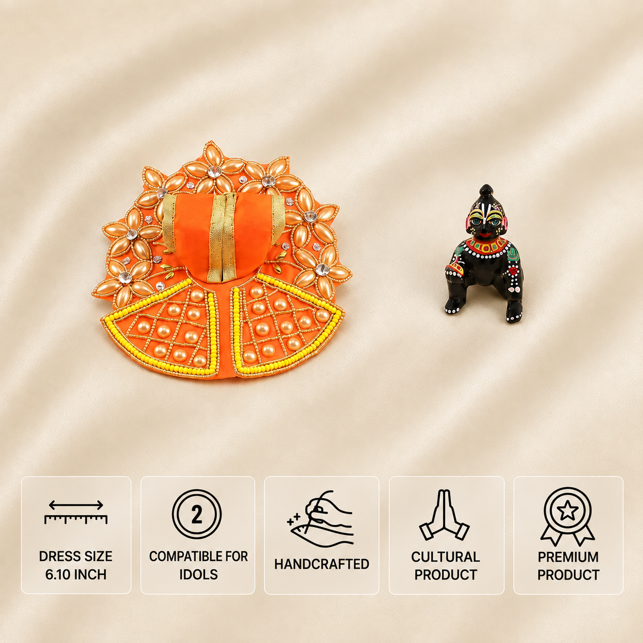 Orange handcrafted Laddu Gopal dress for 2 number idol with golden floral embroidery and pearl detailing.