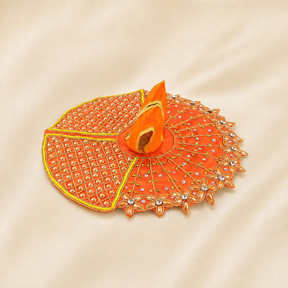 Orange Laddu Gopal poshak with pearl lattice work, floral border and golden embroidery
