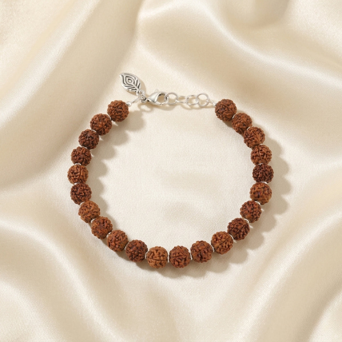 Close-up view of original rudraksha bracelet beads and silver clasp