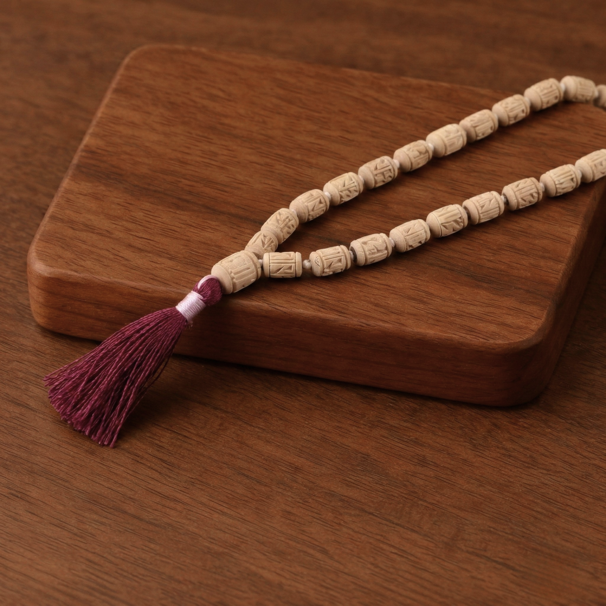 Certified original Tulsi japa mala featuring 54 hand carved beads and a traditional tassel