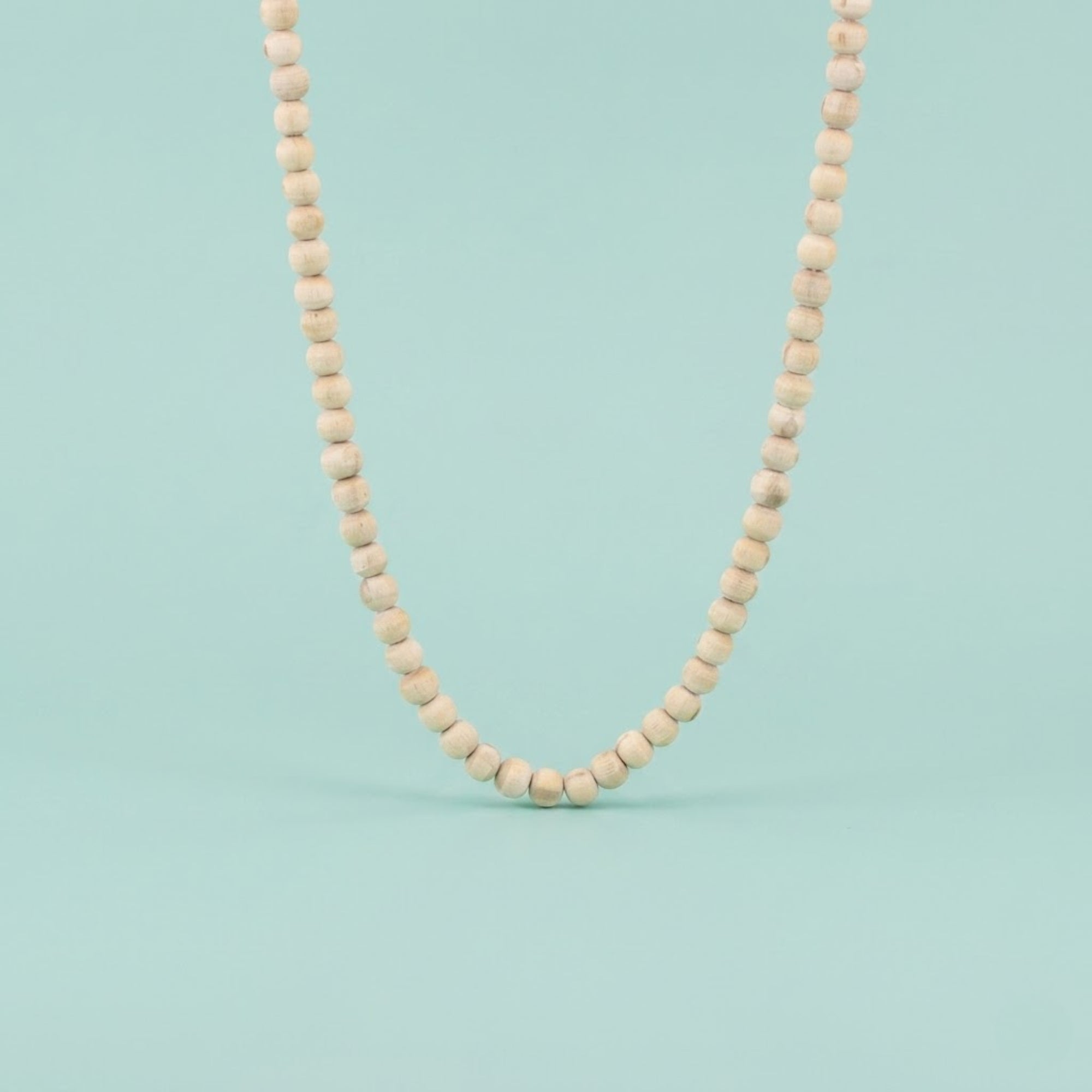Close up of smooth big round beads on an original Tulsi Kanthi neck mala