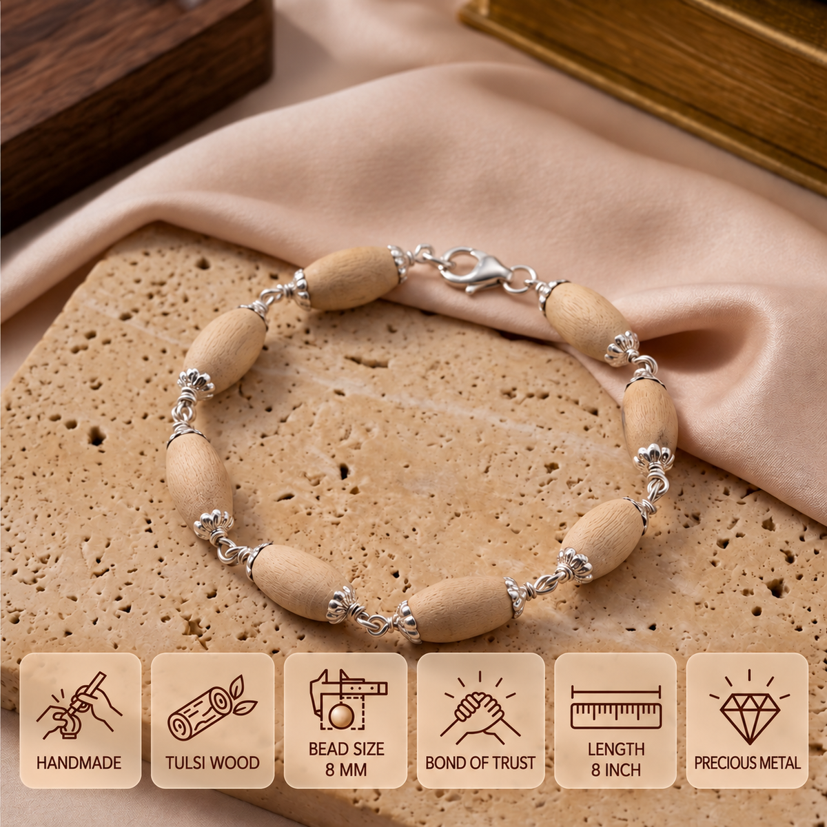 Oval Tulsi bead bracelet with silver-toned fittings on a beige stone surface, showing 8 mm beads and an 8 inch length.