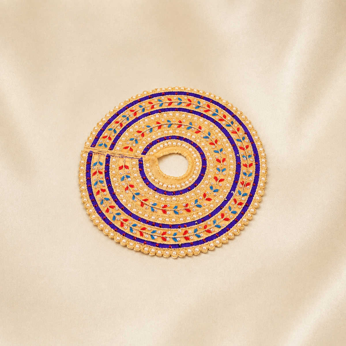 Beige Laddu Gopal dress with purple border, pearl work and colourful leaf embroidery