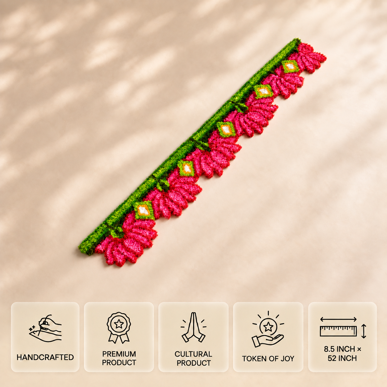 Pink and green door rangoli with white and yellow accents, measuring 8.5 × 52 inches.