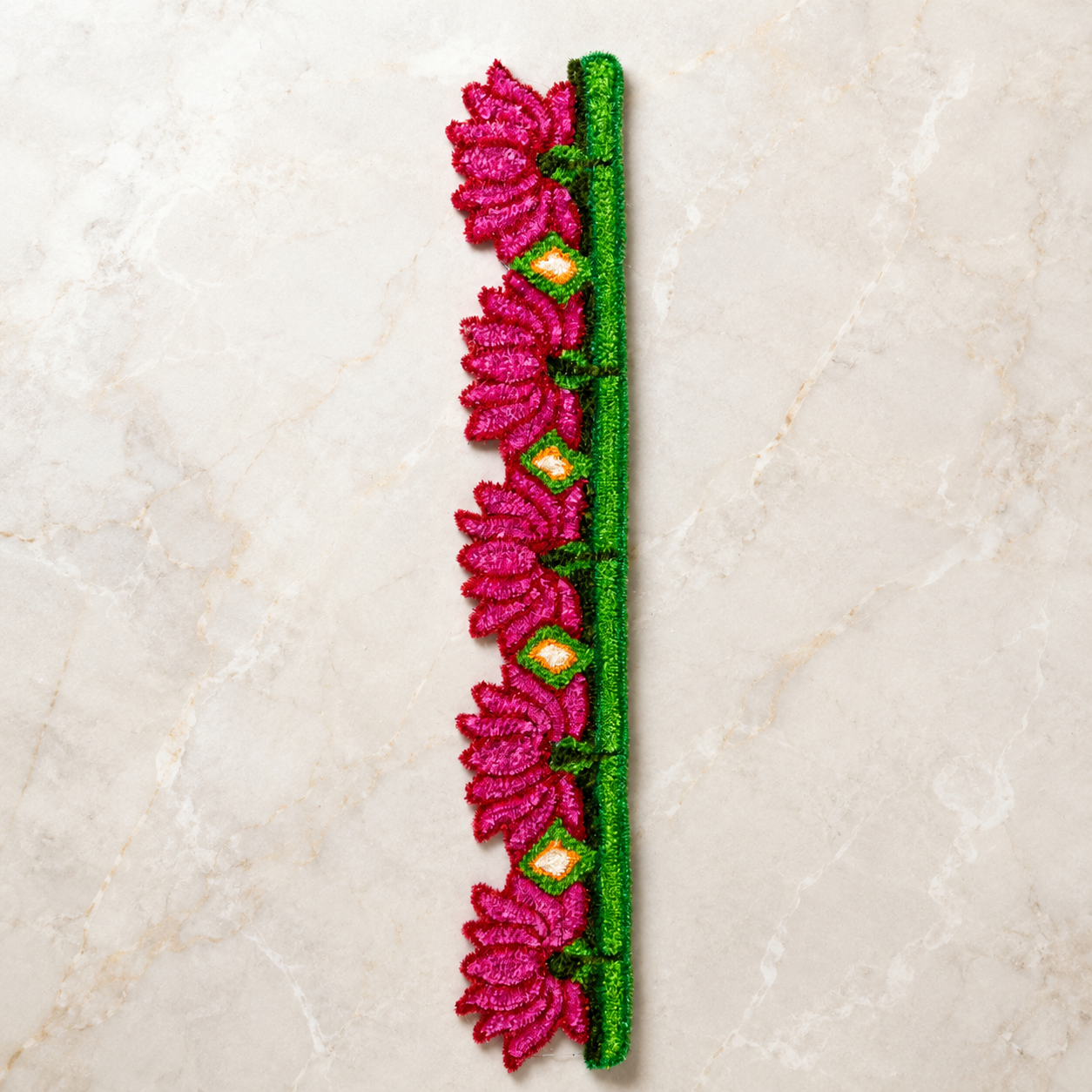 Pink lotus woolen rangoli toran with green detailing for Diwali home and entrance decoration