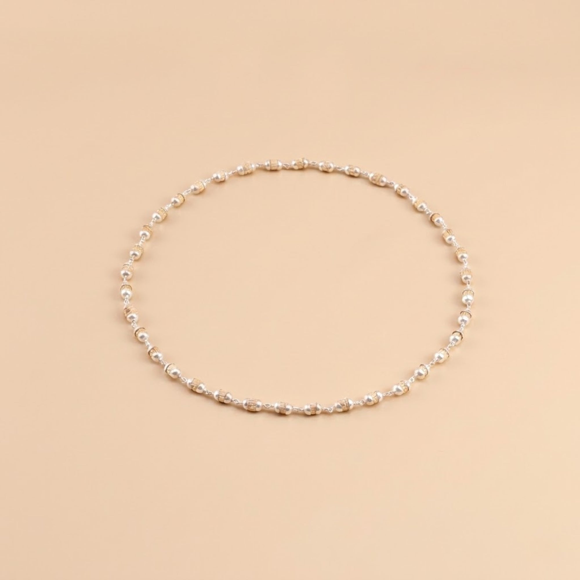 pure silver Tulsi bead necklace featuring carved cylindrical wood beads
