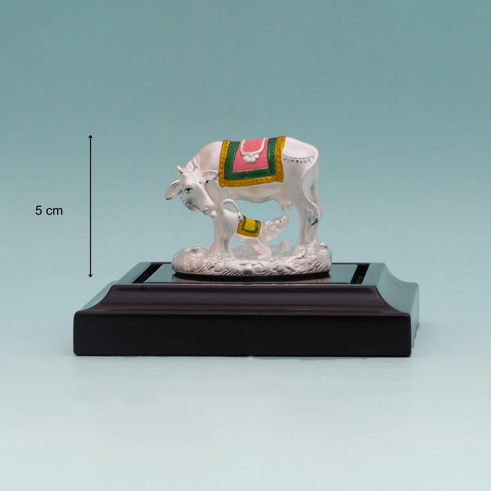 Height and base size dimensions of the pure silver Kamdhenu Cow with calf idol