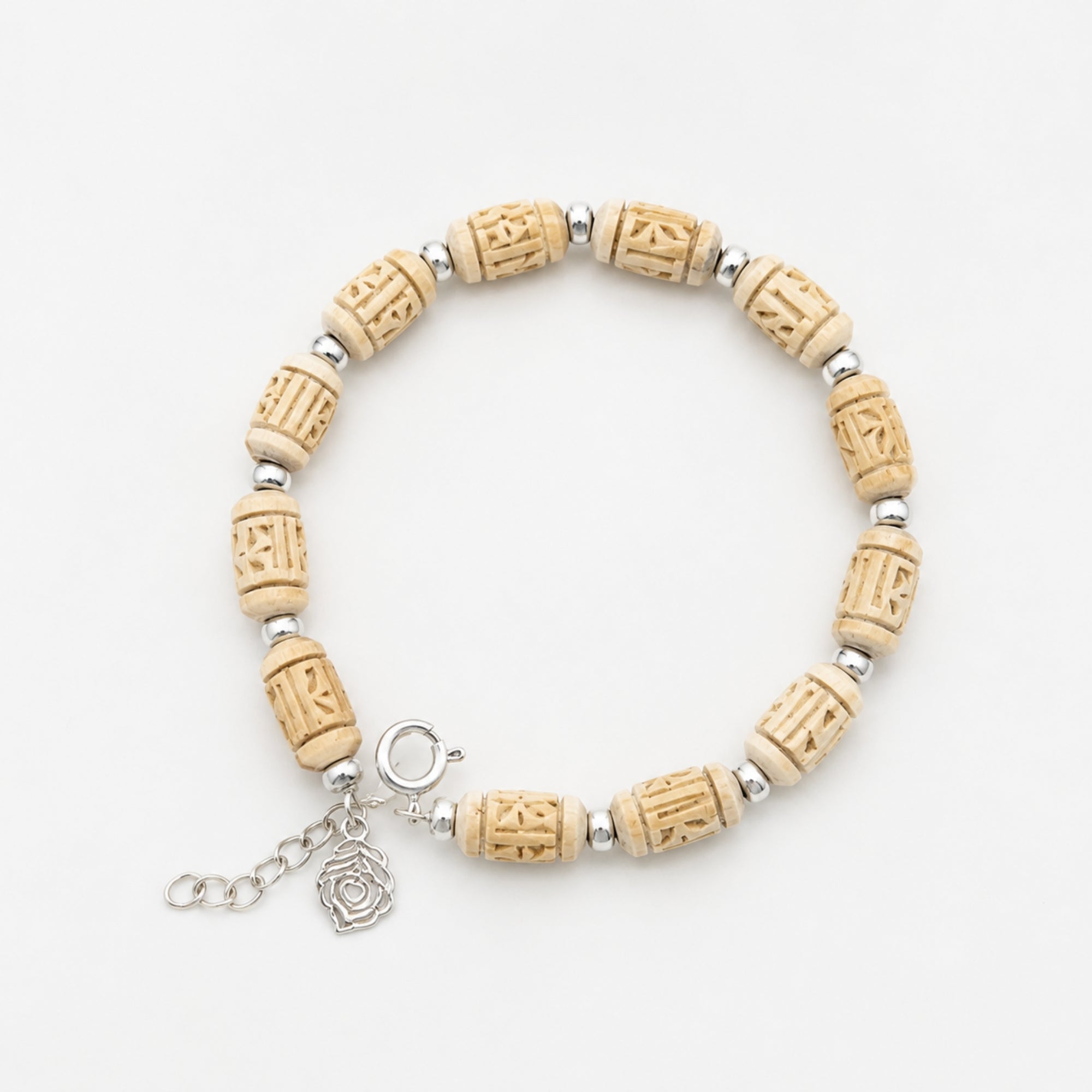 pure Tulsi wood bracelet featuring an attached silver Morpankh charm