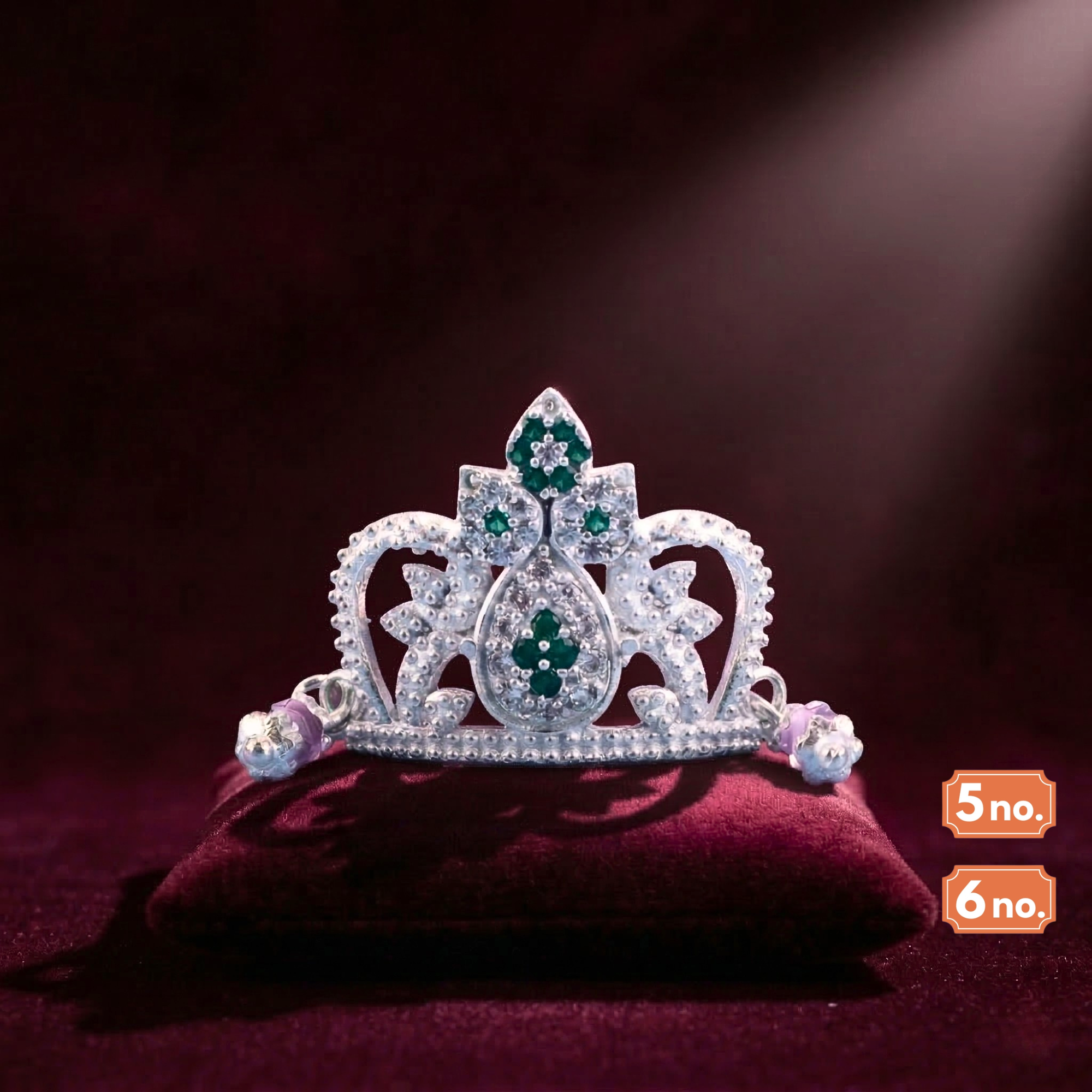 Pure 925 silver crown mukut for Laddu Gopal with green stones on dark velvet cushion