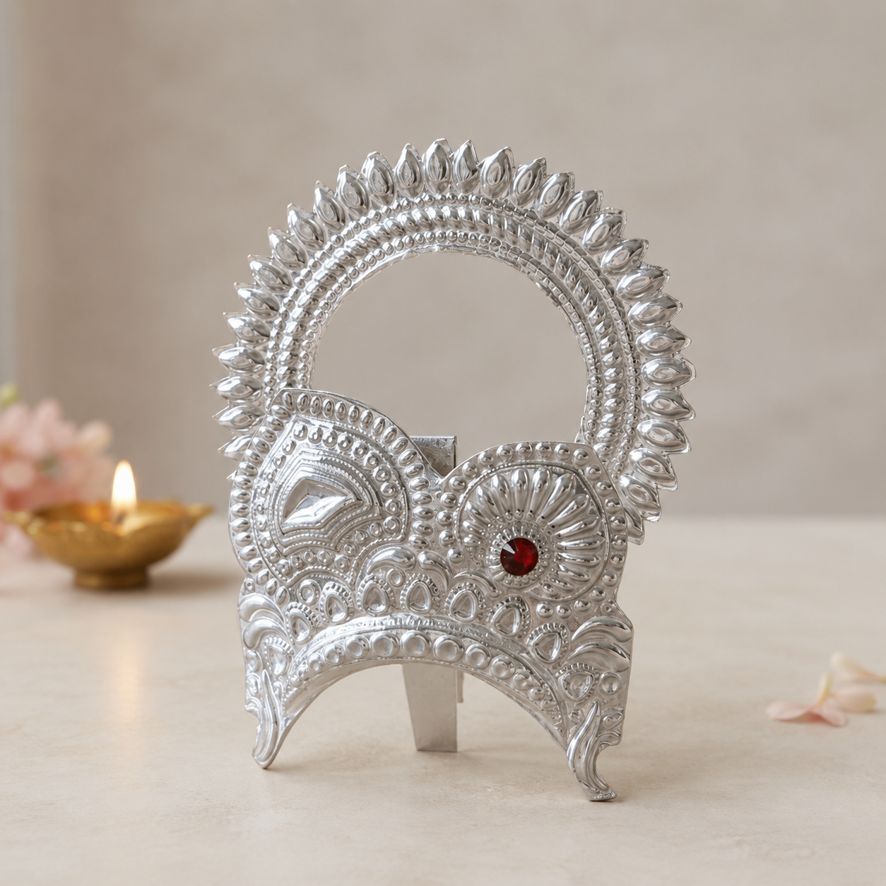 Pure 925 silver traditional carved mukut for Laddu Gopal displayed with brass diya