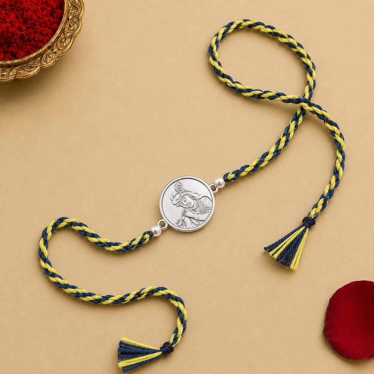 Pure silver Lord Krishna face coin charm rakhi on dual tone green and yellow braided cord