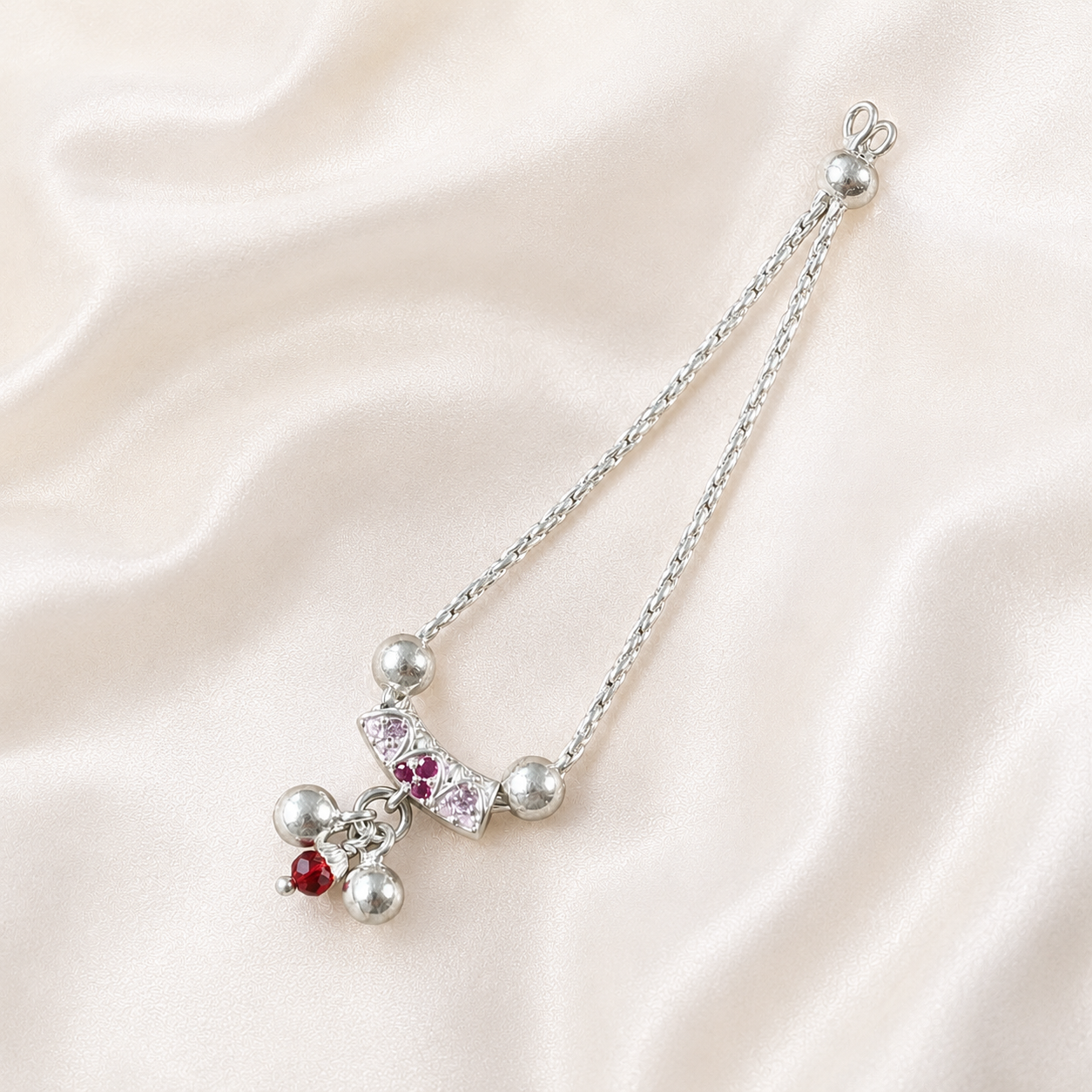 Alternate angle view of pure silver necklace for Kanha Ji on soft silk background