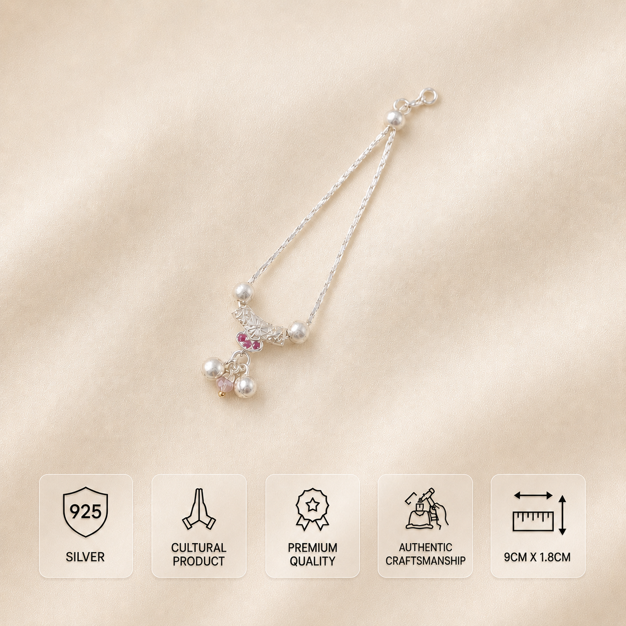 A silver-toned chain necklace with pearl-like beads and a small floral charm accented by pink stones, displayed on a soft beige fabric background. Five informational cards at the bottom highlight product features: 925 silver, cultural product, premium quality, authentic craftsmanship, and dimensions of 9cm x 1.