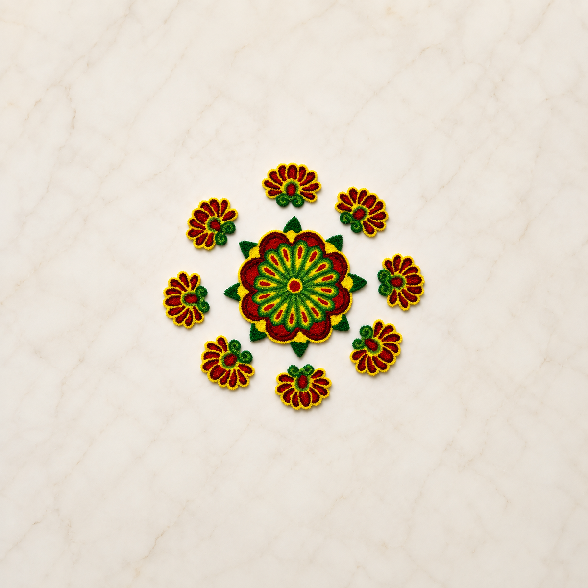 Red, yellow and green floral rangoli set with central flower and eight matching pieces