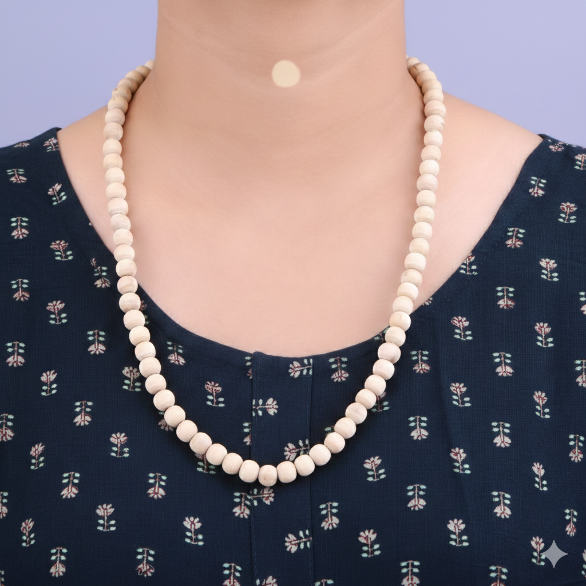 Woman wearing a pure Tulsi kanthi mala with smooth round beads around her neck