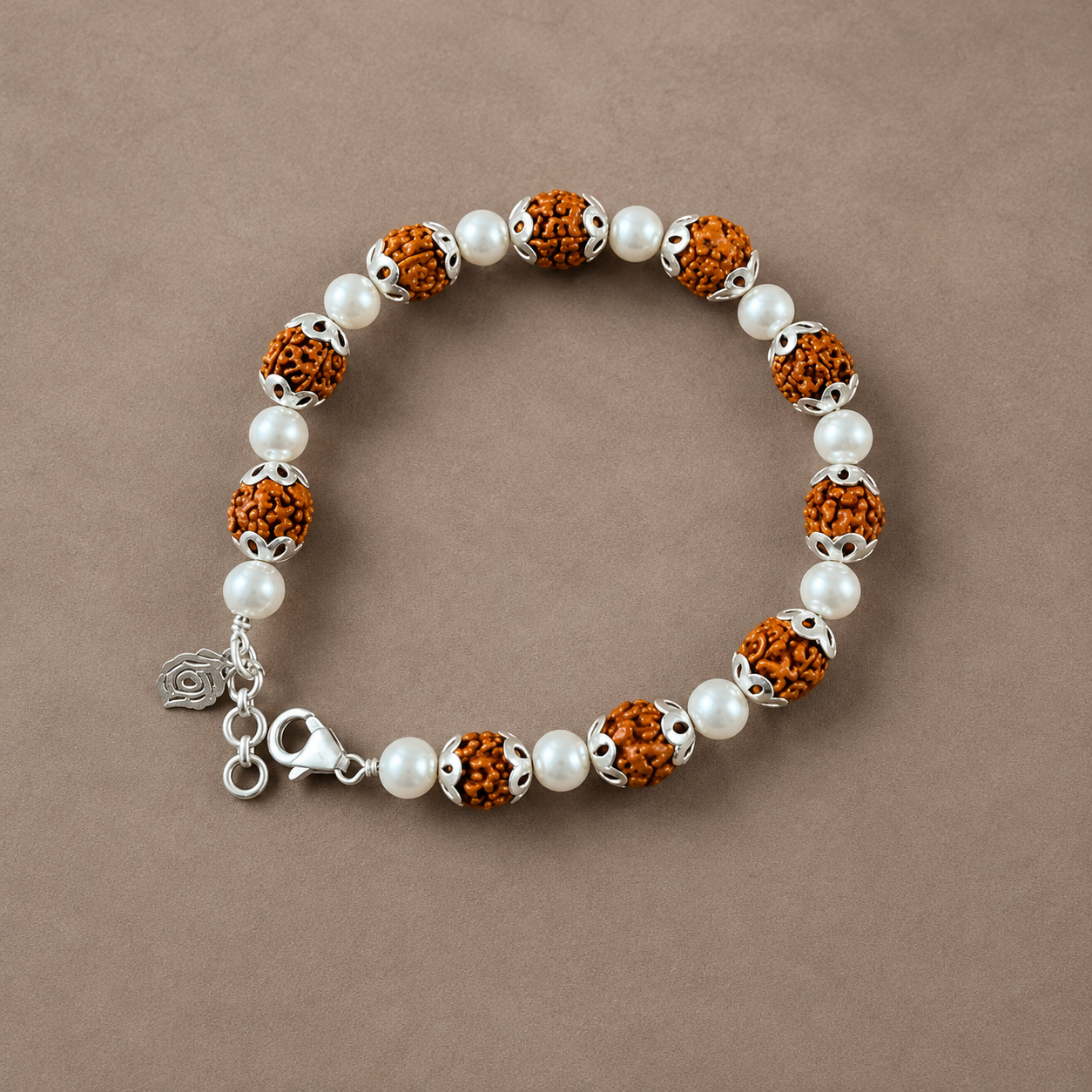 Full length display view of silver rudraksha and pearl bracelet