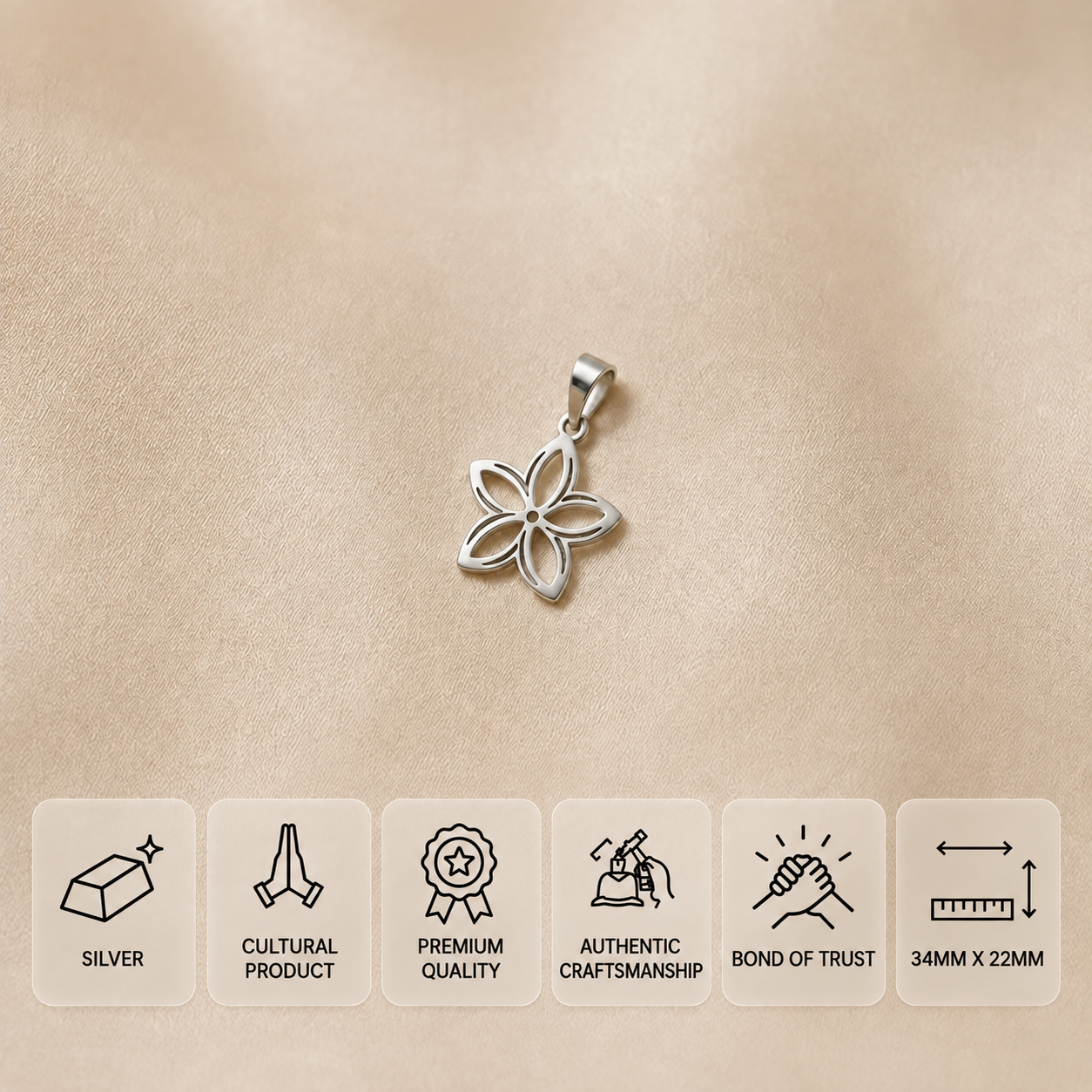 Silver five-petal flower pendant on beige fabric with feature cards and 34 × 22 mm dimensions.