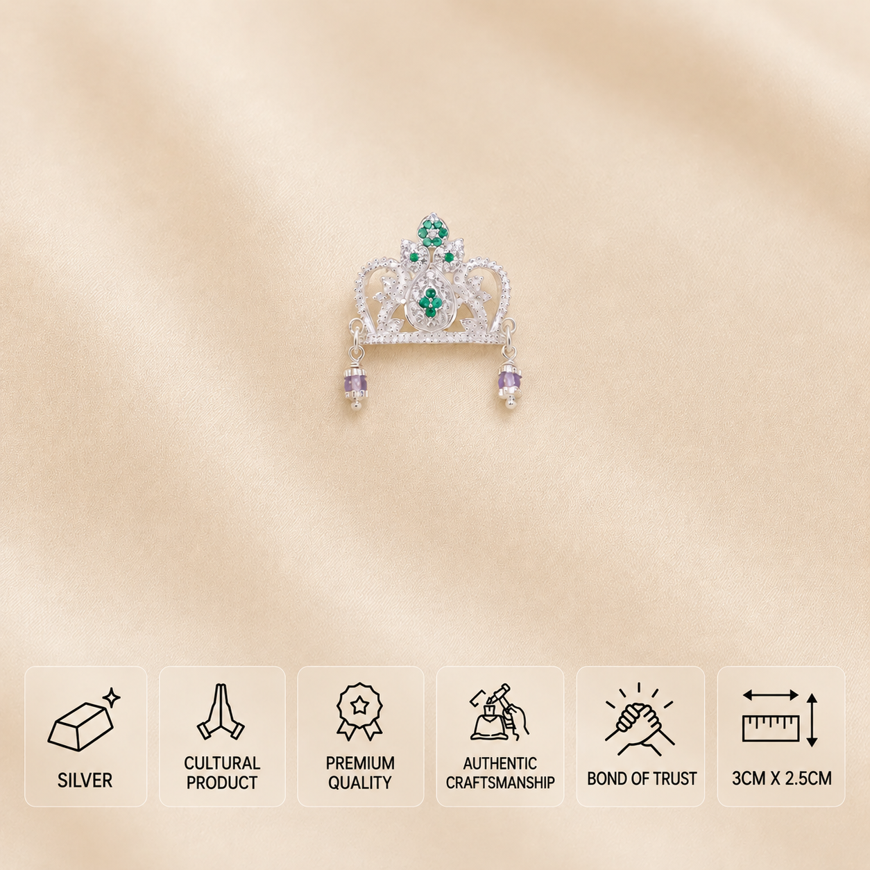 Silver idol crown with green and pink stones and amber hanging beads, measuring 3 × 2.5 cm.