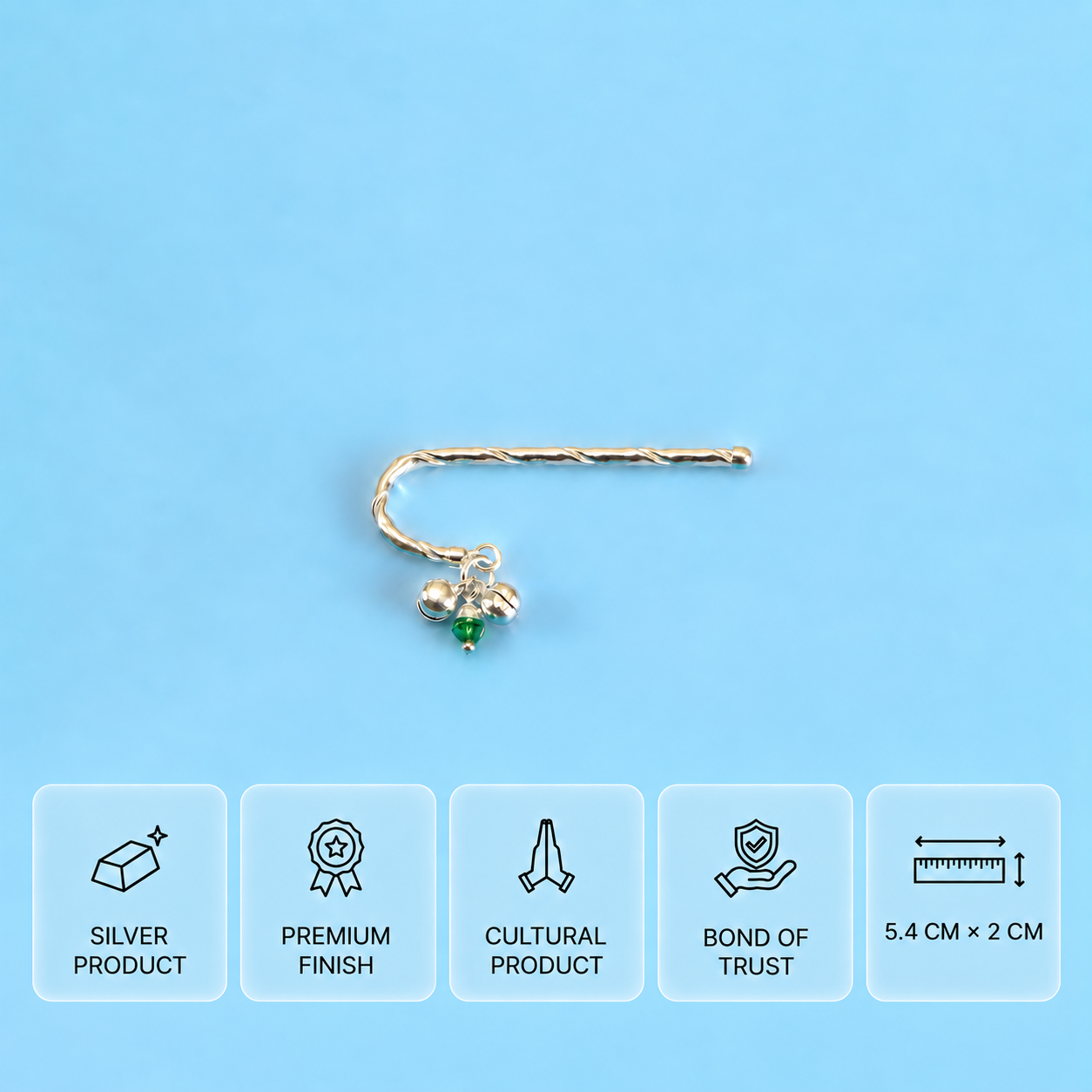 Curved silver Laddu Gopal deity flute with two bells and a green bead, measuring 5.4 × 2 cm.
