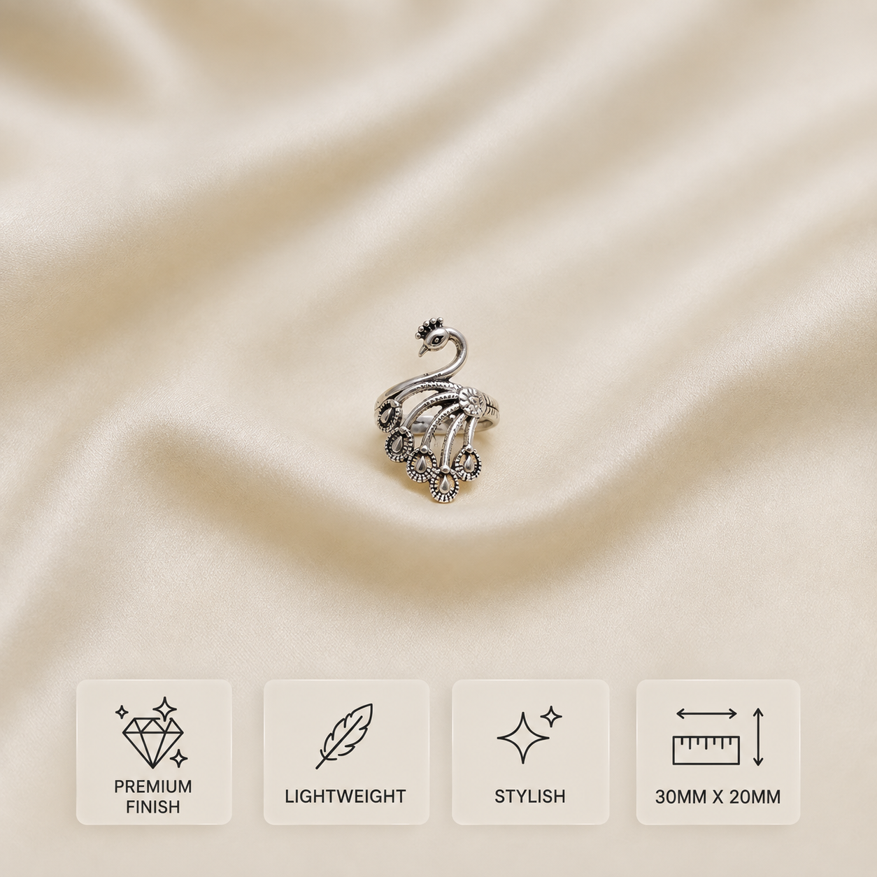Silver peacock ring with intricate feather detailing, premium finish and 30mm x 20mm size 