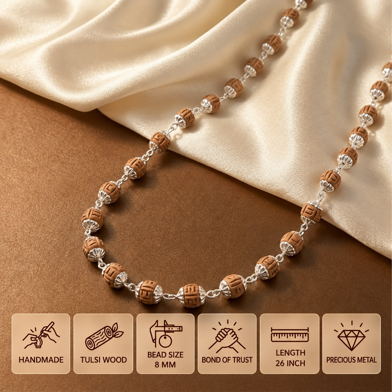 Silver Tulsi mala with wooden beads and silver fittings on a tan surface, with 8 mm bead size and 26 inch length shown.