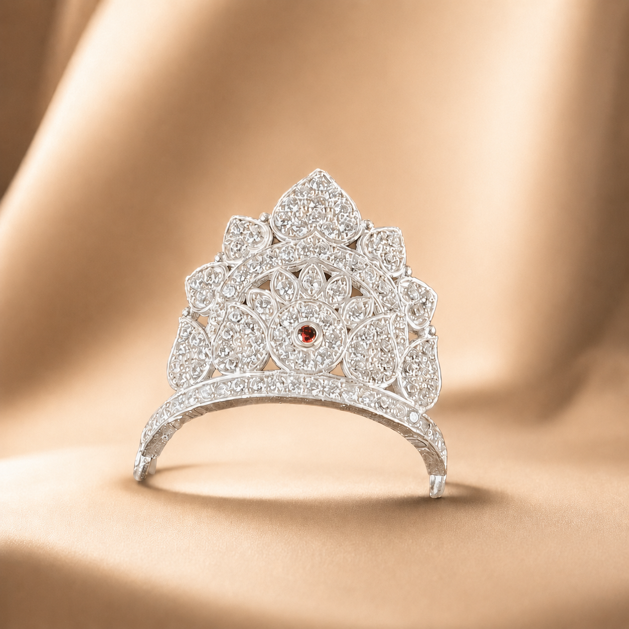 Sterling silver mukut for Laddu Gopal with pave CZ stones on gold silk backdrop