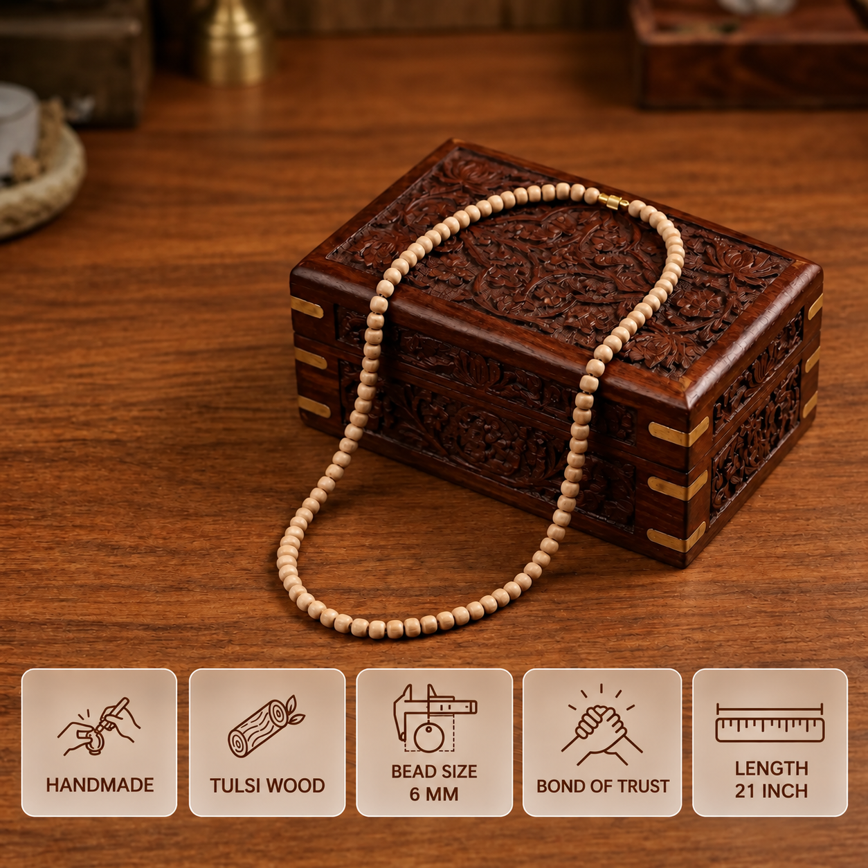 Tulsi bead mala draped over a carved wooden box, with feature cards showing 6 mm bead size and 21 inch length.