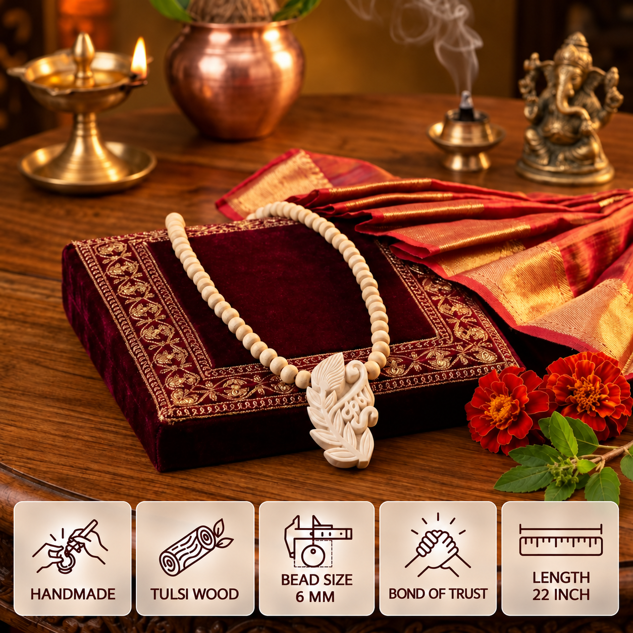 Tulsi bead mala with a carved pendant on burgundy cloth, with feature cards showing 6 mm bead size and 22 inch length.