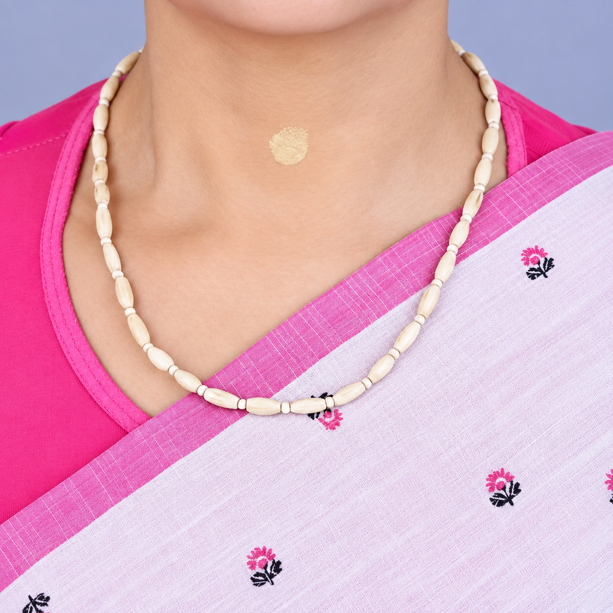 Woman wearing natural Tulsi Mala with handmade 4 mm and 5 mm Tulsi beads, 18 inch length