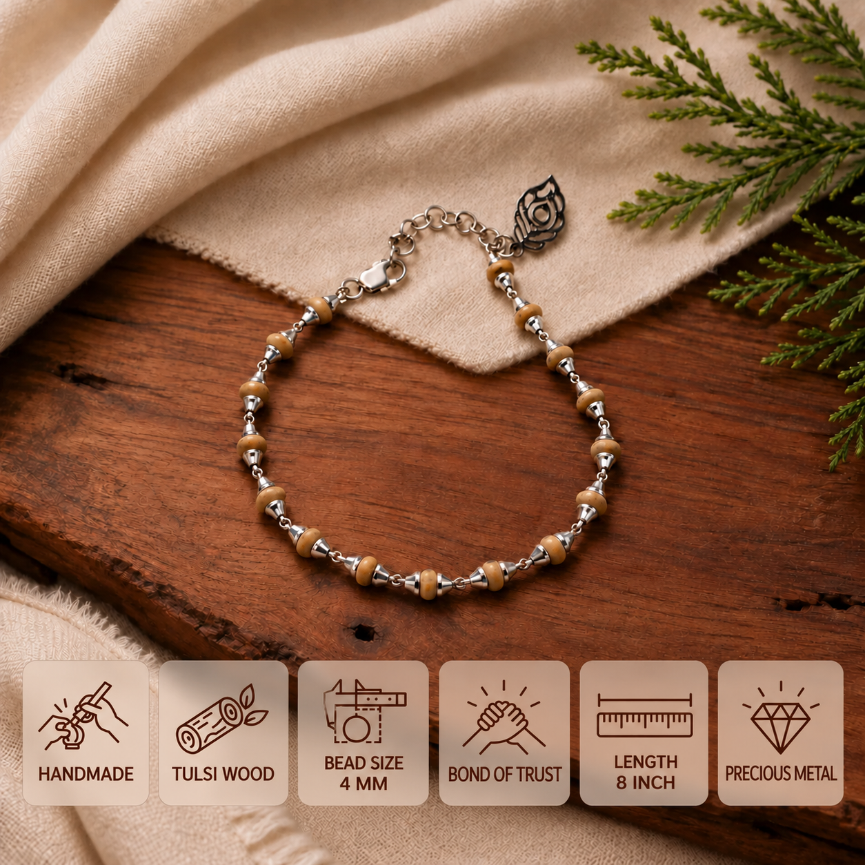 Tulsi bead bracelet with silver-toned fittings and an extension chain, showing 4 mm beads and an 8 inch length.