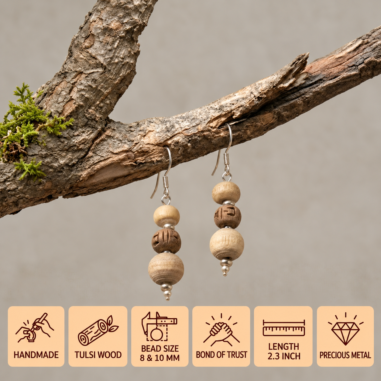 Tulsi wood bead earrings hanging from a tree branch, with 8 mm and 10 mm beads and a 2.3 inch length.