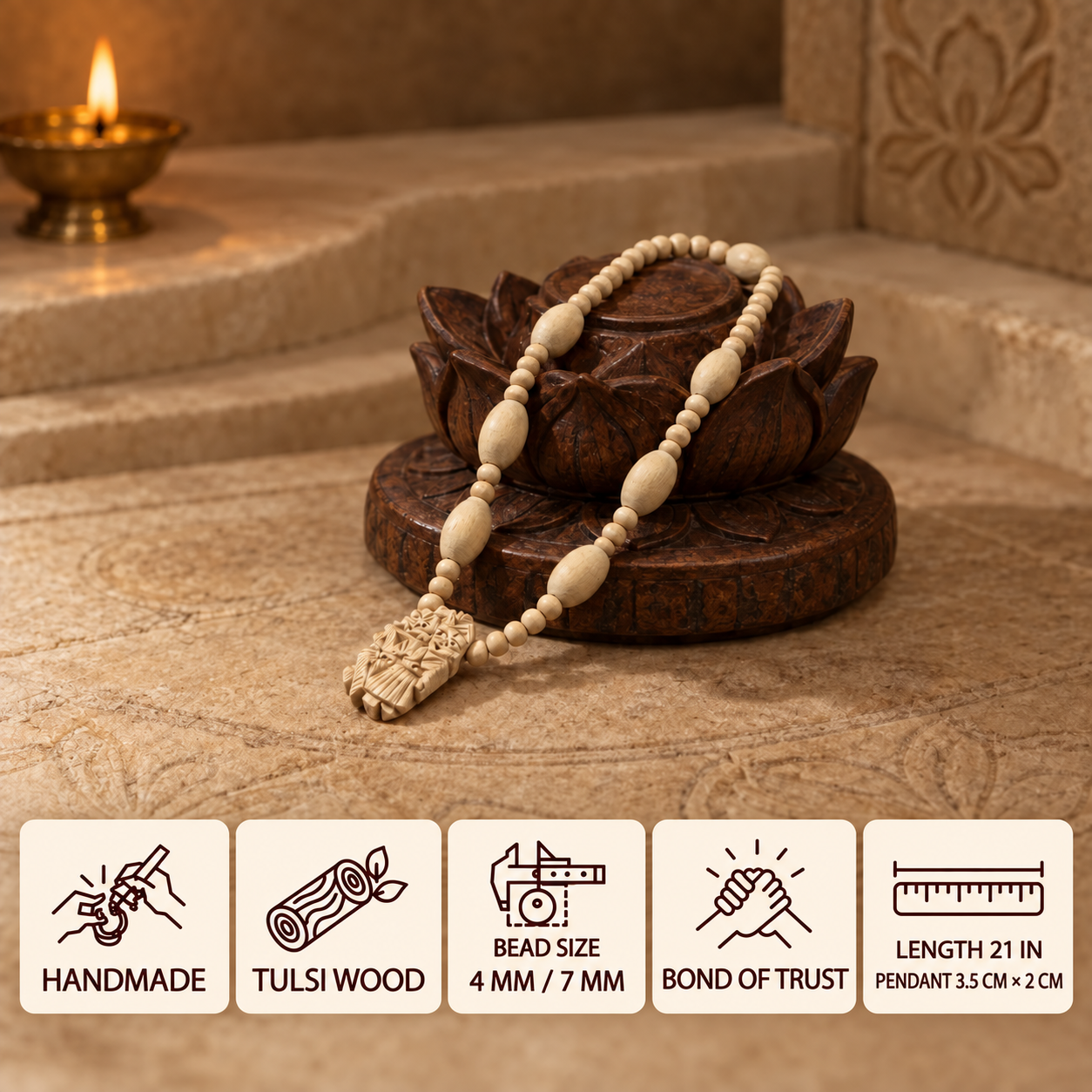 Tulsi wood bead mala with a carved pendant displayed on a wooden lotus stand, with 4 mm and 7 mm beads and a 21 inch length.